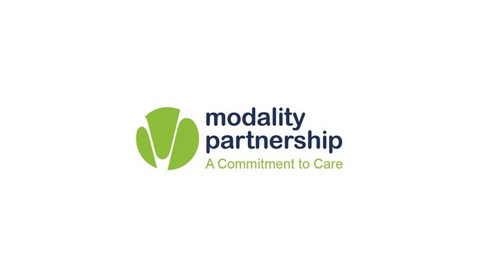 Modality Partnership logo with text saying 'A commitment to care'