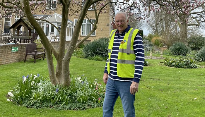 Sue Ryder garden volunteer, David Wheedon, in the St. John's Hospice garden