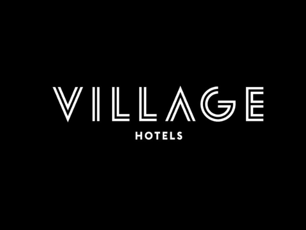 Village hotels logo - white text on black