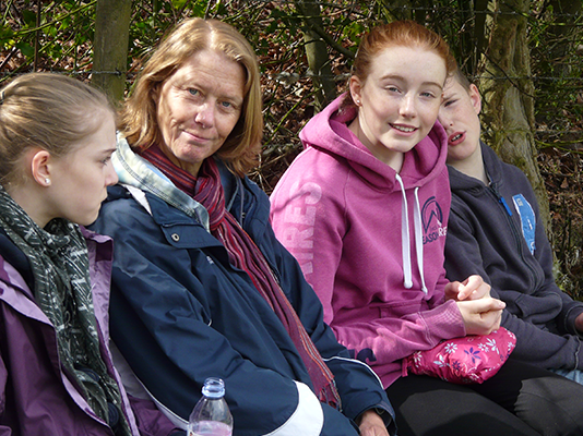 Heather and her three children on a walk in 2012.