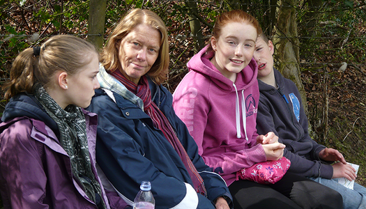 Heather and her three children on a walk in 2012.