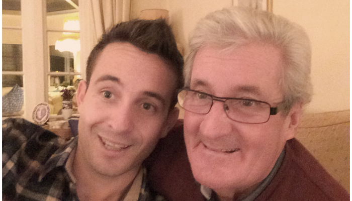 Joe and his father Roger posing, Joe raised £7,000 in his dad's memory